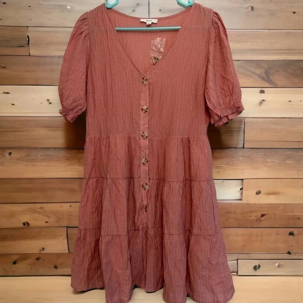 Mine NWOT’s women’s short dress with buttons and puff sleeves. Size large